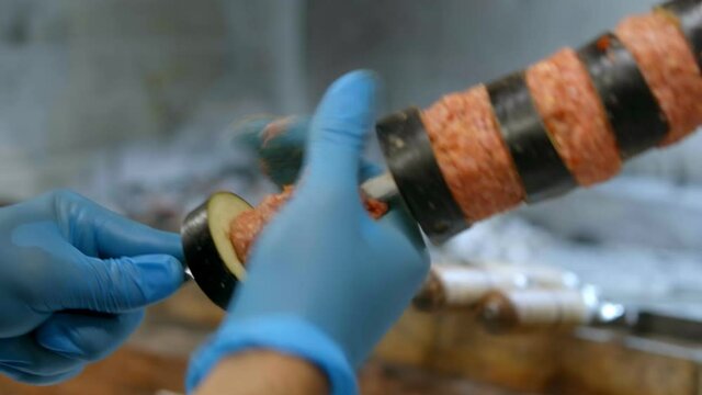 Cooking shish kebab with eggplant. Grilled vegetables on a plate . Arabic traditional food