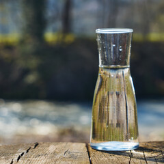 Glass flask with clean drinking water.