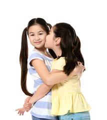 Cute Asian sisters on white background