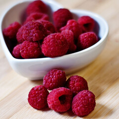 raspberries in a white bowl