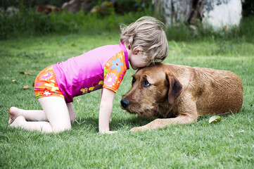 child with dog