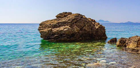 Big rock in natural coastal landscapes on Kos Island Greece.
