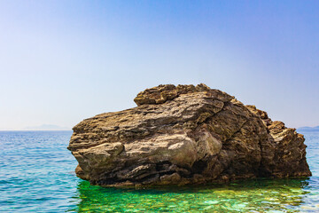 Big rock in natural coastal landscapes on Kos Island Greece.