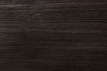 Dark brown wood with beautiful patterns for texture and background