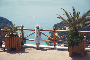 girl tourist stands on the observation deck