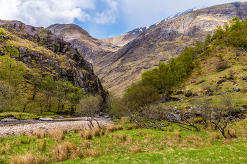 A view down the River Nevis from the Steall Waterfall in Glen Nevis, Scotland on a summers day