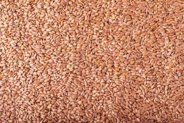 Flax seeds background, close up, view from above, organic food