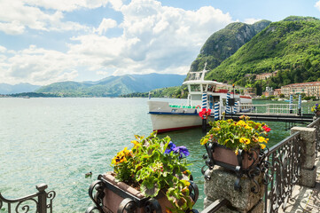 Pier on the embankment of Lake Como, Menaggio, Italy