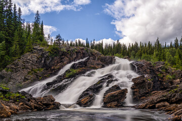 view of the Fiskonfallet waterfall in northern Sweden