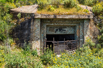 Closeup of one of the countless military concrete bunkers or pillboxes in southern Albania built by...
