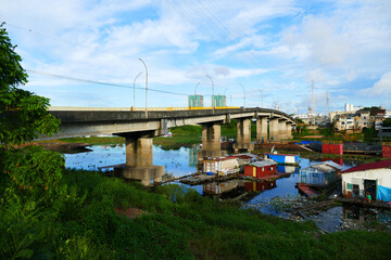 Bridge over the Side arm Educandos (Igarape Educandos), a Sidearm of the Rio Negro river in Manaus,...