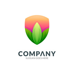 Shield and leaf logo design vector icon of nature protection - modern emblem badge symbol