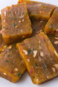 glossy and sticky sweet candy called masket or mascat in sri lanka, translucent and textured toffee made from ghee and vegetable oil