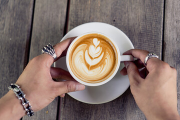 Latte art coffee in a white mug