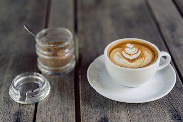 Latte art coffee in a white mug
