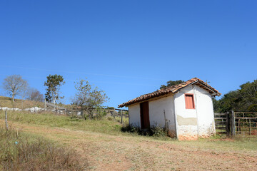 rustic colonial house on a typical rural farm in Brazil