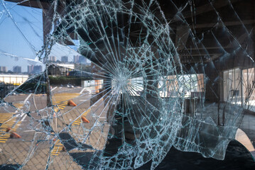 Chaos Unleashed: Shattered Shop Glass Window Amidst the Turmoil of July 2021 Riots and Vandalism in Durban.