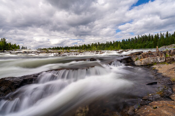 view of the Trappstegsforsarna waterfall in northern Sweden