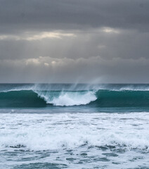 Stormy ocean view with big waves breaking on the Atlantic Ocean in Spain. Winter Atlantic storm...
