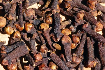 Top view of dried clove seeds, in shallow focus
