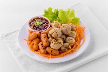 Toasted meatballs and grilled sausage tasty street food