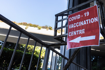 Direction signage to covid-19 vaccination centre at public infrastructure