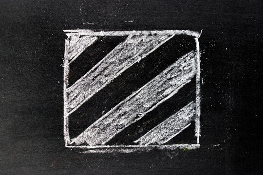 White chalk hand drawing in square with striped line shape on blackboard background