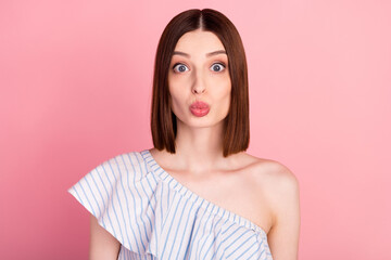 Photo of impressed brunette millennial lady blow kiss wear white top isolated on pink color background