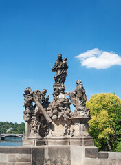 Obraz premium Sculpture of Madonna and Saint Bernard in Prague