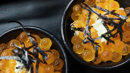 Ikura roe. Salmon Ikura Roe Served with rice and top with japanese Seaweed. Ikura don very famous menu in Hokkaido Japan. Most Served in hotel buffet breakfast. salmon roe or red caviar. Japanese food