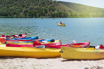 Fototapeta premium Canoe on the shore outdoor water sport in a river healthy lifestyle