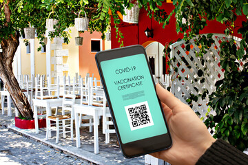vaccination qr code,vaccine certificate and digital passport of covid-19, , hand with mobile phone...