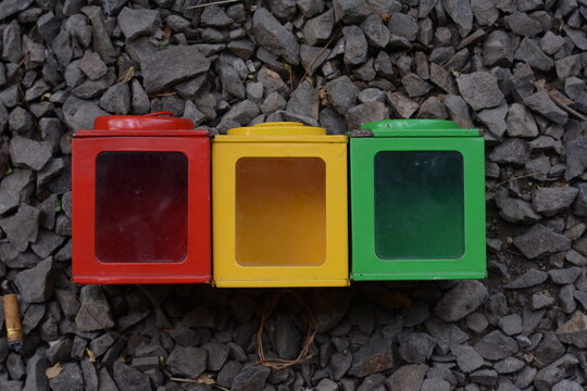 close-up of rubik's cube on stone texture background. green, yellow and red rectangles.