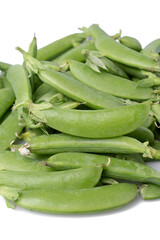 A pile of Sugar Snaps on a white table isolated