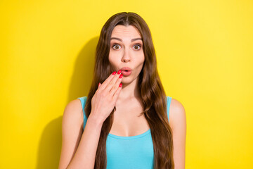 Fototapeta na wymiar Portrait of attractive amazed cheerful girl sudden news pout lips isolated over bright yellow color background