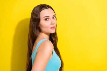 Photo portrait girl with long hair wearing casual clothes isolated vivid yellow color background
