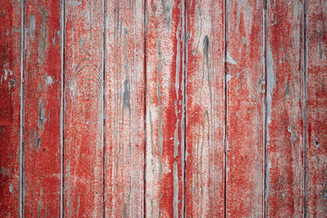 Weathered and Worn Red Wooden Fence
