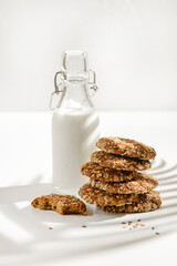 oatmeal cookies with a bottle of milk