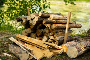 Stack of firewood for making fire and cooking food on camping.
