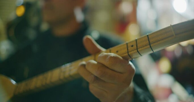 A Local Musician Plays Traditional Folk Music At The Citadel in Erbil, Iraq