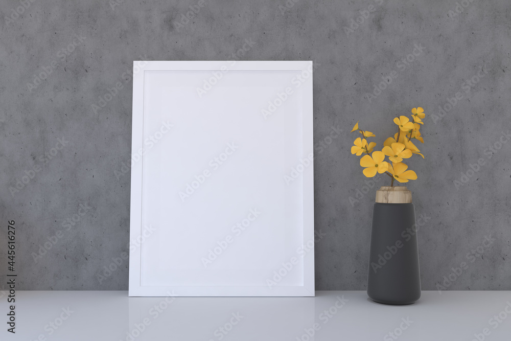 Poster frame with a blank canvas and a vase with flowers