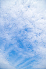 Blue sky background with clouds.