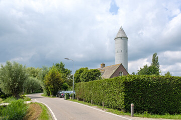 Fototapeta na wymiar Water tower Pietje Pencil in Nieuwkoop, Zuid-Holland Province, The Netherlands