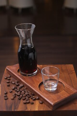 a fresh black coffee coming out from pour over v60 method