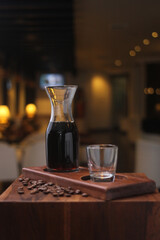 a fresh black coffee coming out from pour over v60 method