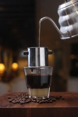 a traditional method vietnam coffee drip which can coming out the coffee flavor, served with sweet...