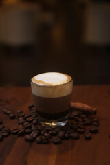 hot ristretto coffee with bold crema which coming out the coffee flavor and poured with white foam 