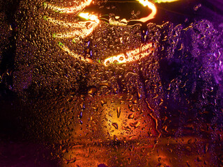 Misted glass, colorful abstract rainbow colored mist rain drops dew drops water droplets...