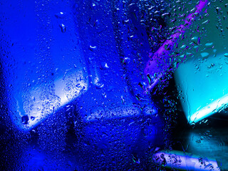 Misted glass, colorful abstract rainbow colored mist rain drops dew drops water droplets...
