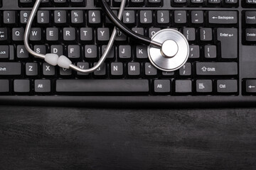 Stethoscope on the computer keyboard. Online consultation with a doctor. Online treatment